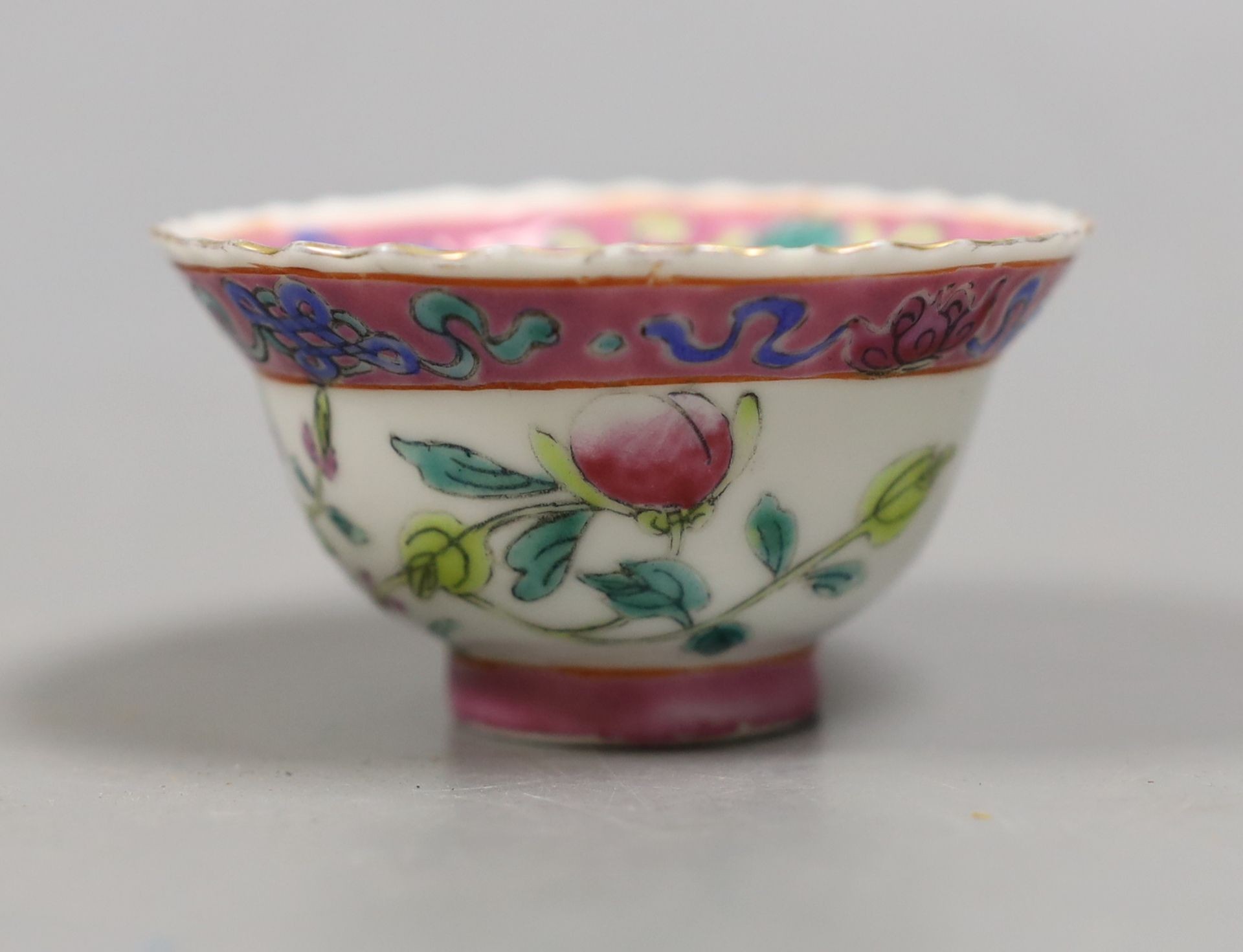 A Chinese Straits famille rose tea bowl, 7 cms diameter.